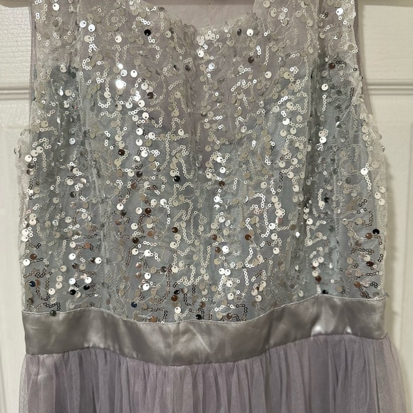 This is a long, gray, shimmery dress. - Picture 3 of 4